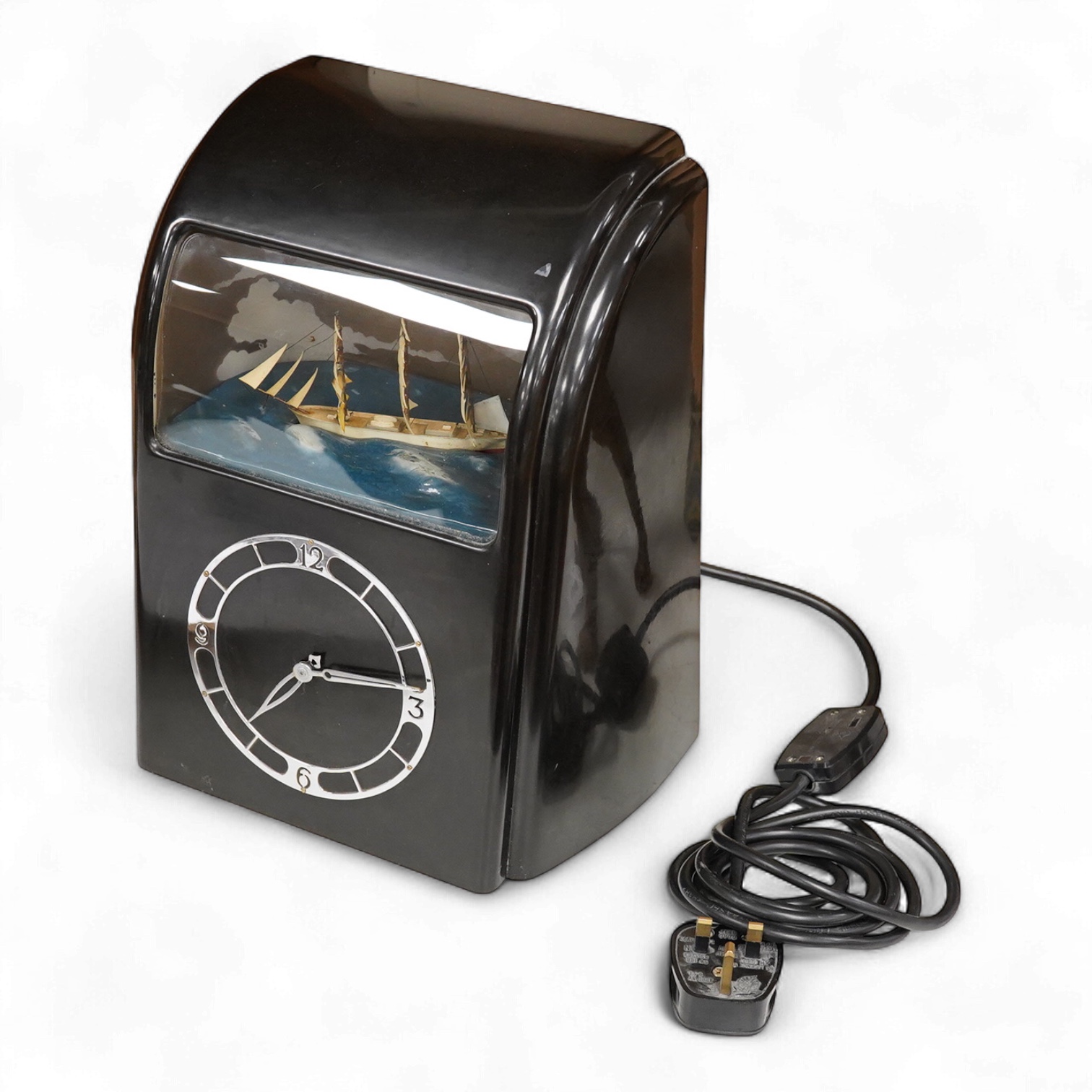 A 1930s ‘Vitascope’ black bakelite clock, 33cm high